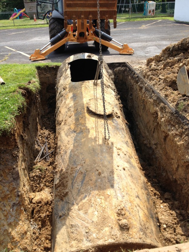 An underground tank being removed.