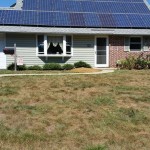 A home with solar panels where an underground tank was recently dug up.