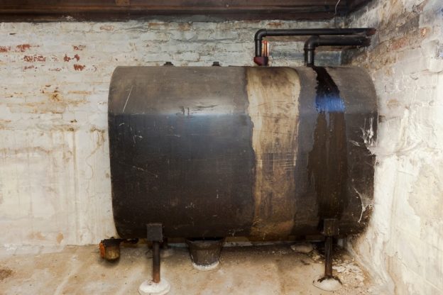 Above-ground oil tank in the basement