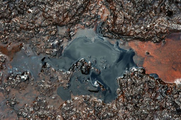 Close-up of a leaking oil spill
