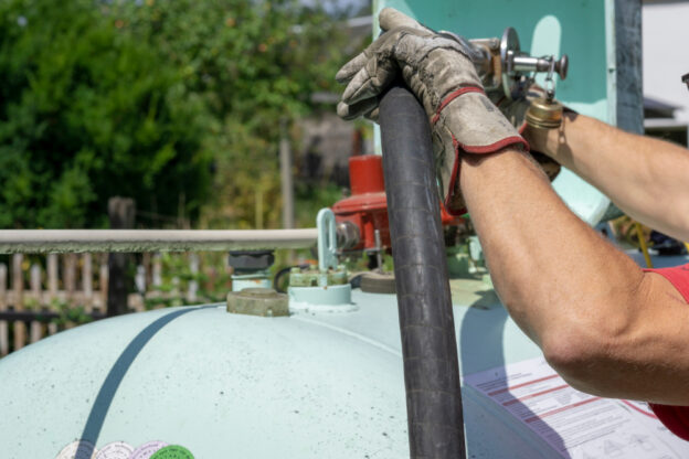filling residential gas tank up before the start of spring and summer